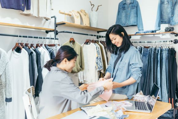 Fashion Designer Working In Studio