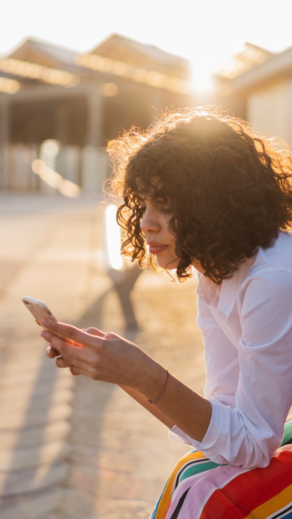 Woman Filing Taxes on Phone