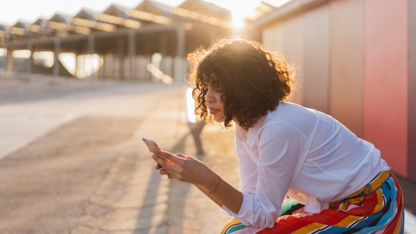 Woman Filing Taxes on Phone