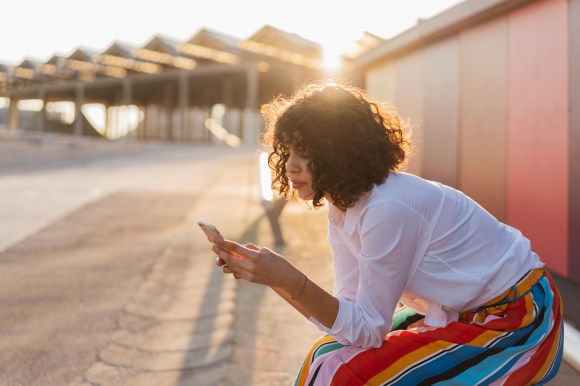 Woman Filing Taxes on Phone