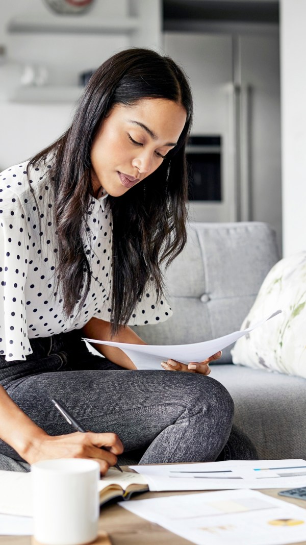 woman sitting with paper