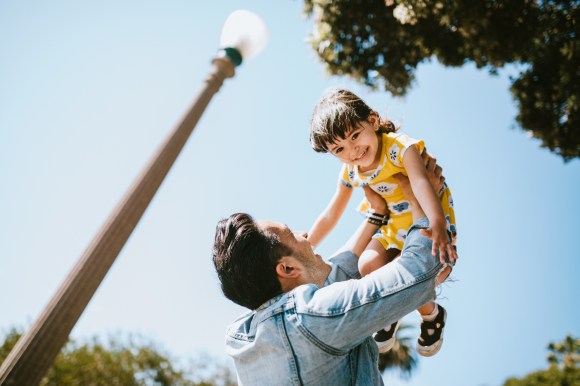 father and daughter outside