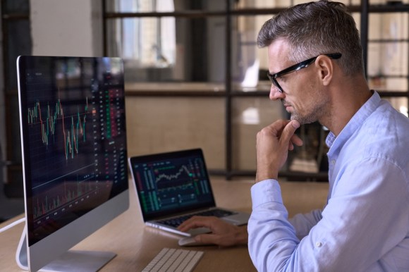 Trader watching stock market.