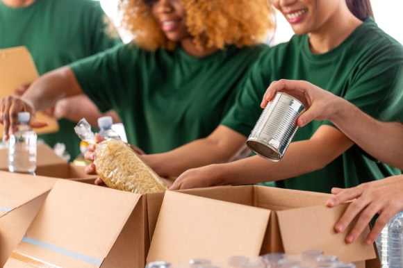 Volunteers sorting donations.