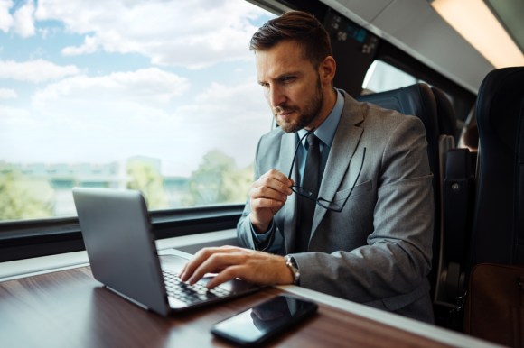 Businessman traveling and working.
