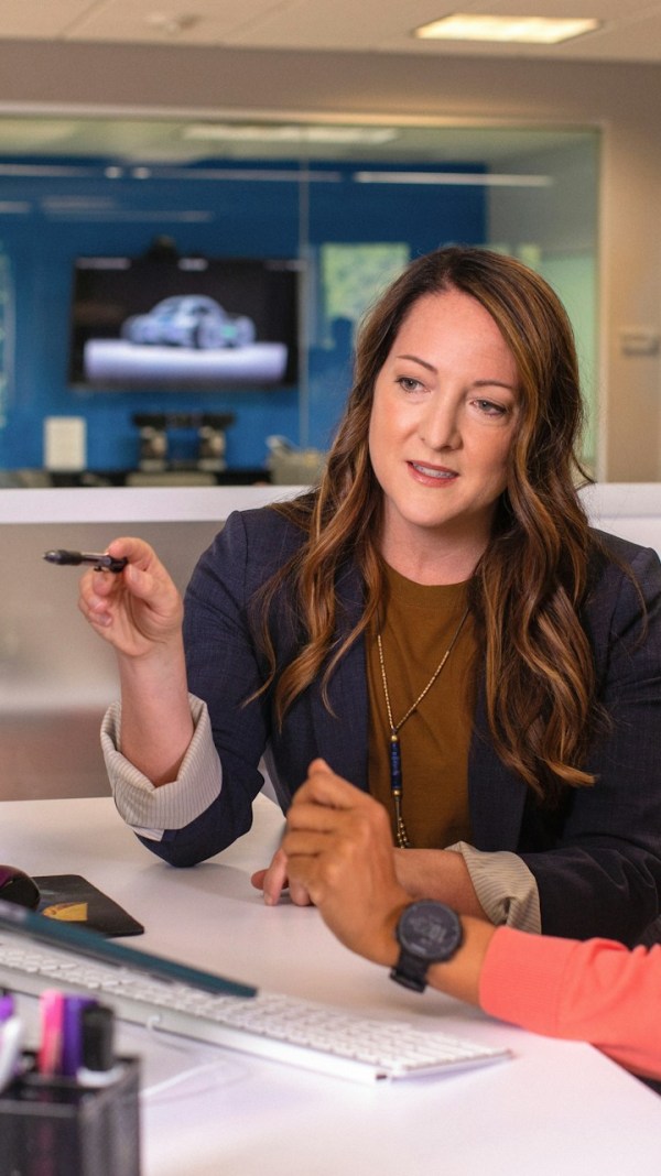 professional services business owner talking with a client
