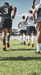 players running onto the field